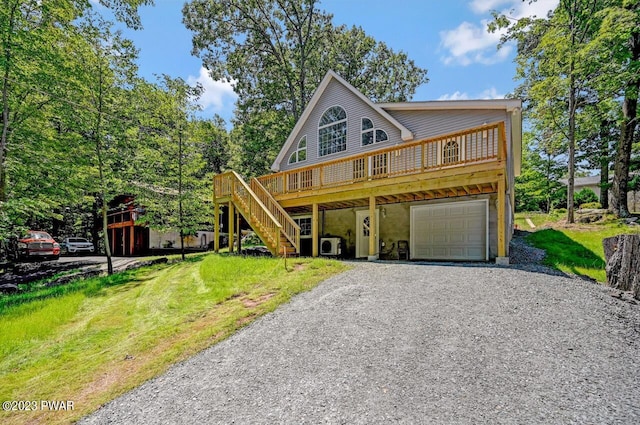 view of front of property with a garage and a wooden deck