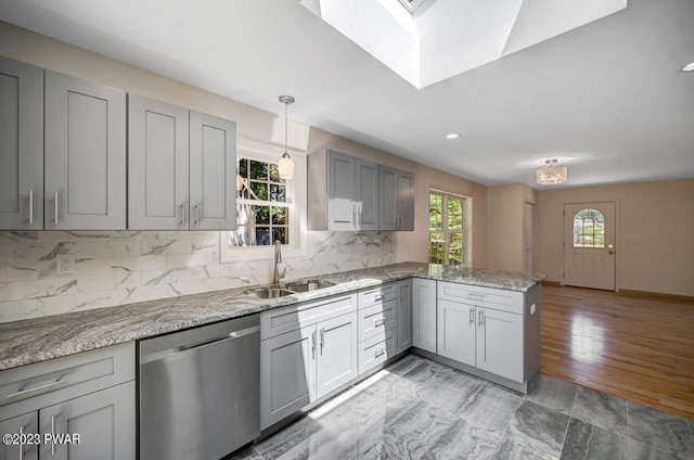 1202 Wallenpaupack Dr, Lake Ariel, PA 18436 - kitchen featuring stainless steel dishwasher, a sink, a peninsula, gray cabinetry, and recessed lighting