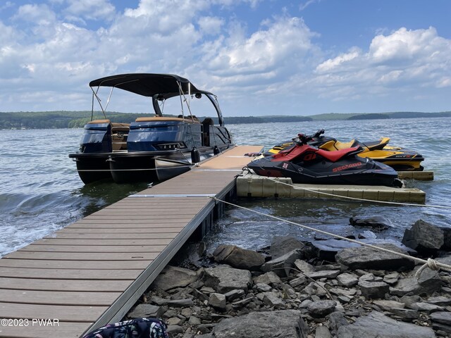 view of dock with a water view