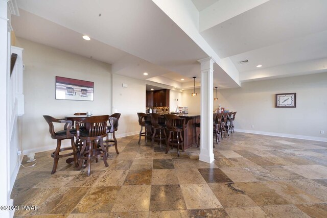 dining space with bar area