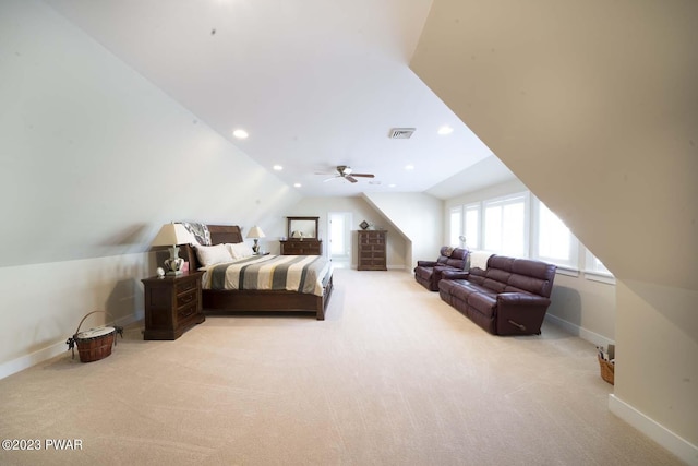 bedroom with light carpet and vaulted ceiling