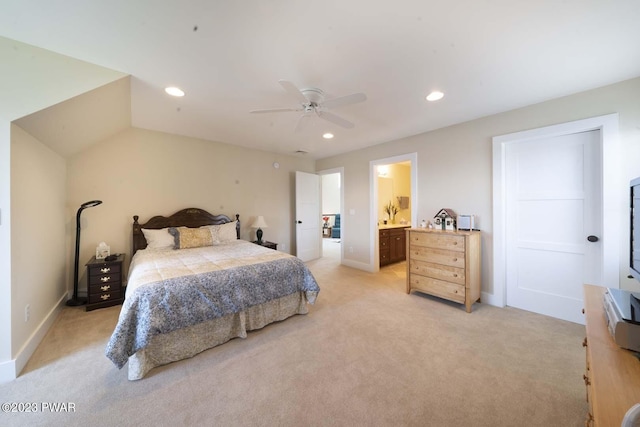 carpeted bedroom featuring ceiling fan and connected bathroom