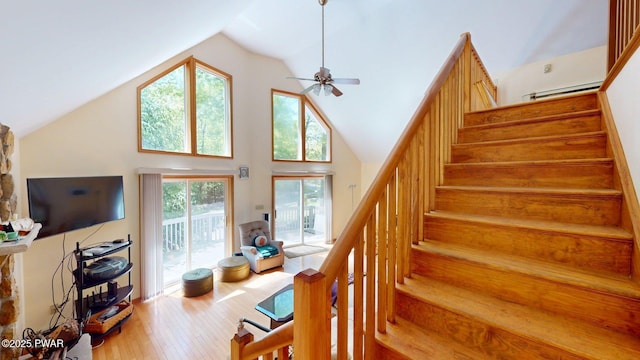 216 Westfall Dr, Dingmans Ferry, PA 18328 - stairway featuring wood finished floors, a ceiling fan, and high vaulted ceiling