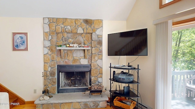 216 Westfall Dr, Dingmans Ferry, PA 18328 - detailed view of a fireplace, baseboards, and wood finished floors