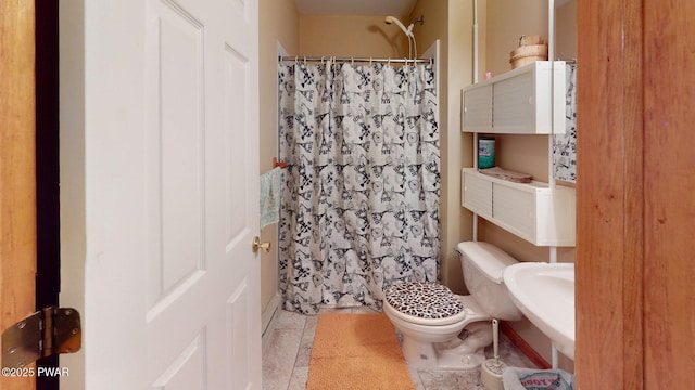 216 Westfall Dr, Dingmans Ferry, PA 18328 - full bath featuring toilet, tile patterned flooring, a shower with curtain, and a sink