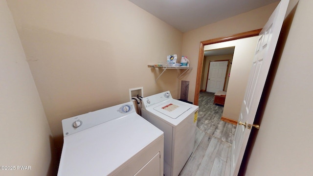 216 Westfall Dr, Dingmans Ferry, PA 18328 - washroom featuring independent washer and dryer and light wood-type flooring