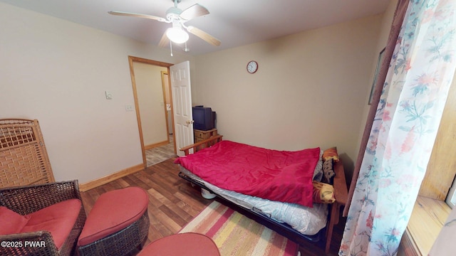 216 Westfall Dr, Dingmans Ferry, PA 18328 - bedroom with wood finished floors, baseboards, and a ceiling fan