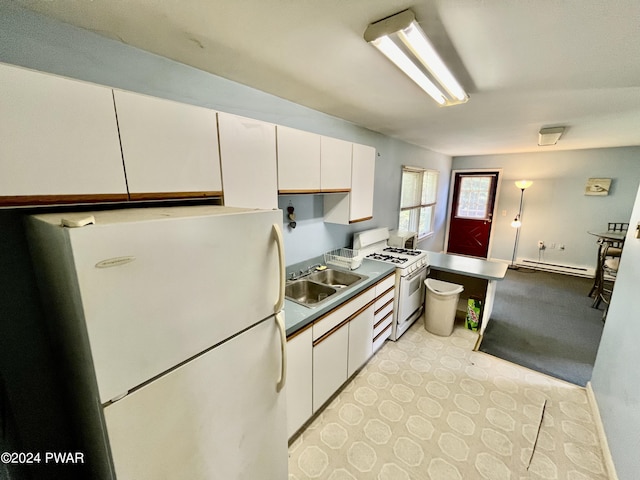 kitchen with white cabinetry, white appliances, sink, and a baseboard radiator