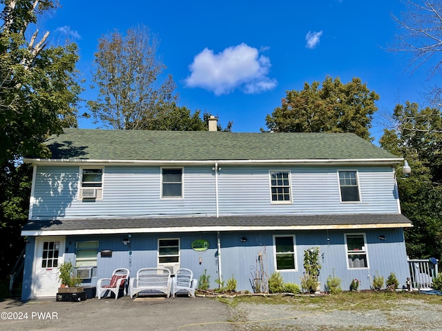 view of front of property with cooling unit