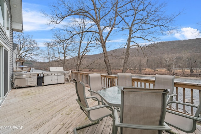111 Riverbend Ln, Beach Lake, PA 18405 - deck with grilling area, a water and mountain view, and outdoor dining area