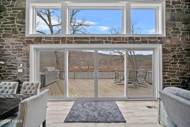 111 Riverbend Ln, Beach Lake, PA 18405 - entryway with visible vents, a wealth of natural light, and wood finished floors