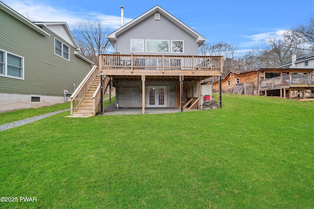 111 Riverbend Ln, Beach Lake, PA 18405 - back of property featuring french doors, a wooden deck, stairs, and a lawn