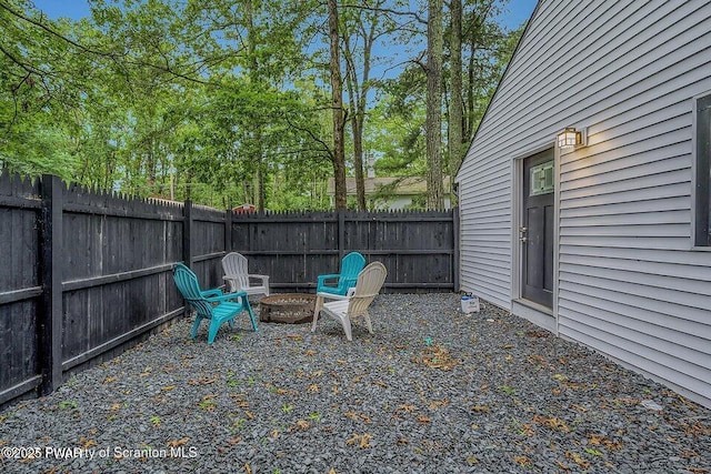 28 Holland Rd, Hawley, PA 18428 - fenced backyard with a fire pit
