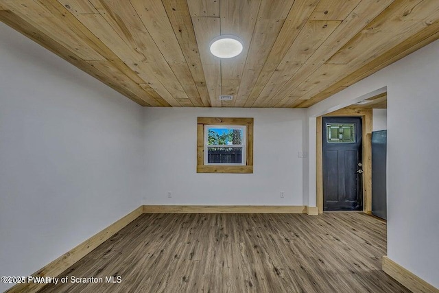 28 Holland Rd, Hawley, PA 18428 - empty room with wood ceiling and wood finished floors