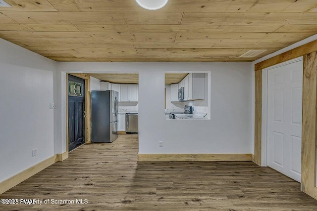 28 Holland Rd, Hawley, PA 18428 - empty room with wooden ceiling and wood finished floors