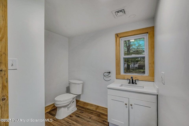 28 Holland Rd, Hawley, PA 18428 - half bathroom featuring vanity and wood finished floors