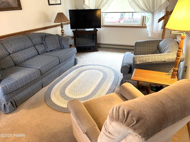 living room featuring baseboards, carpet floors, and a baseboard radiator