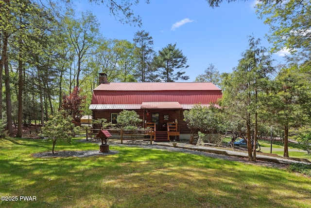 128 Timber Ln, Tafton, PA 18464 - view of home's community featuring a lawn and a wooden deck