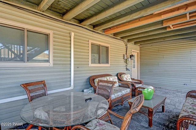 view of patio with outdoor dining area