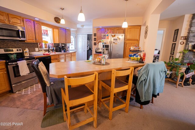 dining space featuring dark colored carpet