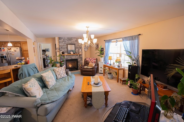 living area featuring light carpet, an inviting chandelier, and a stone fireplace