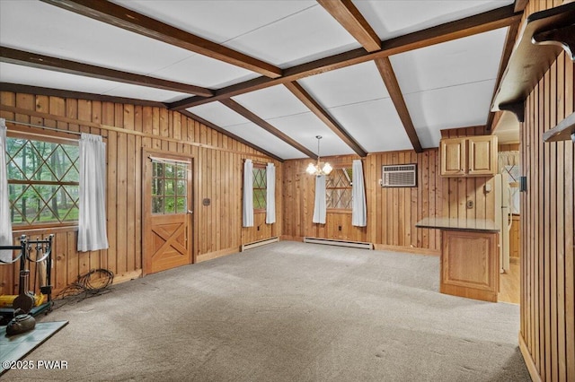 1081 Maple Lake Dr, Bushkill, PA 18324 - unfurnished living room with a baseboard radiator, a chandelier, a baseboard heating unit, a wall mounted AC, and light colored carpet
