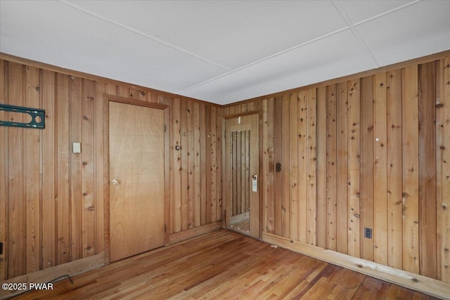 1081 Maple Lake Dr, Bushkill, PA 18324 - spare room with wood walls and wood finished floors