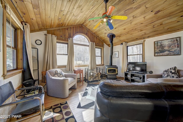 109 Pebble Rock Rd, Lackawaxen, PA 18435 - living area with a ceiling fan, wooden ceiling, vaulted ceiling, and a wood stove
