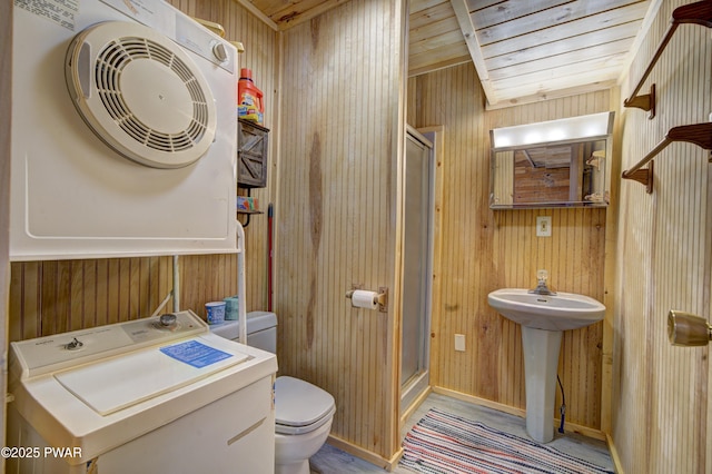 109 Pebble Rock Rd, Lackawaxen, PA 18435 - full bath featuring washer / clothes dryer, toilet, wooden walls, and a shower stall