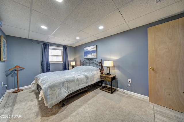 109 Pebble Rock Rd, Lackawaxen, PA 18435 - bedroom featuring baseboards, wood finished floors, recessed lighting, and a paneled ceiling