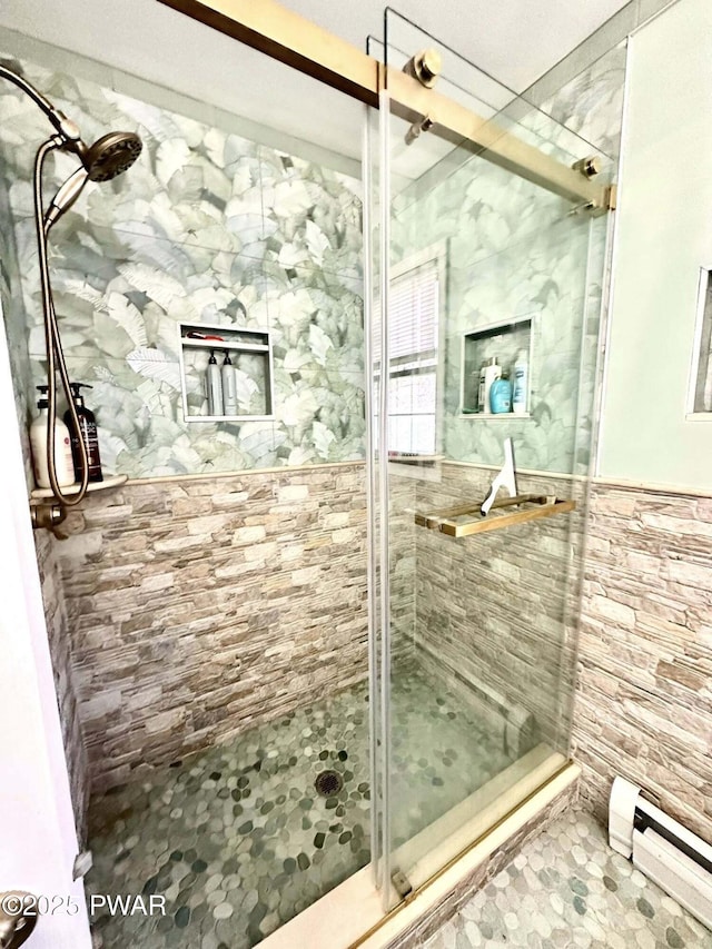 205 Waterview Dr, Lords Valley, PA 18428 - full bathroom featuring a baseboard heating unit, a shower stall, and wainscoting