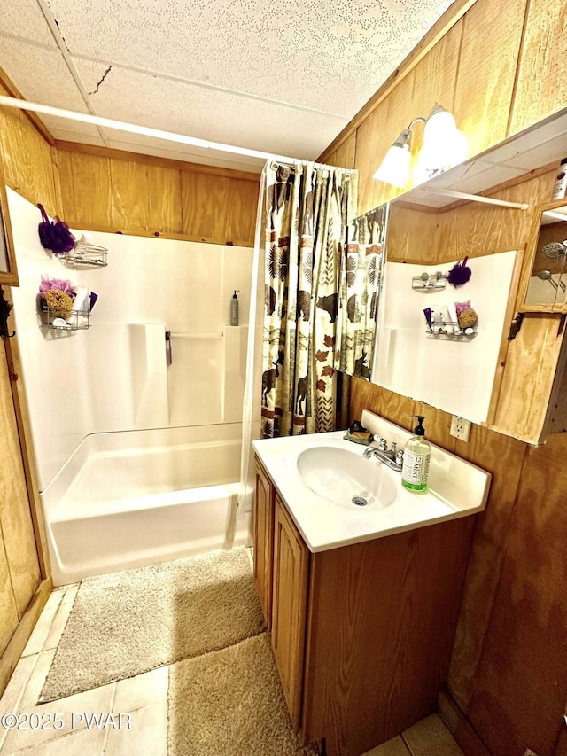 205 Waterview Dr, Lords Valley, PA 18428 - bathroom with vanity, shower / bath combo with shower curtain, wood walls, and tile patterned flooring