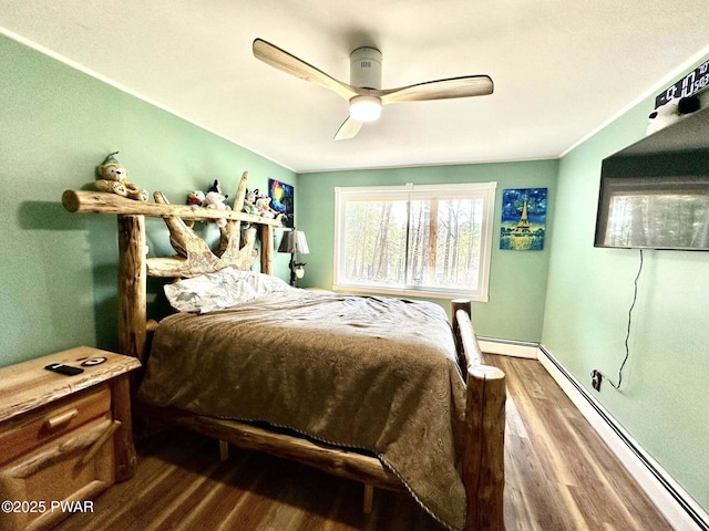 205 Waterview Dr, Lords Valley, PA 18428 - bedroom featuring baseboard heating, wood finished floors, and ceiling fan