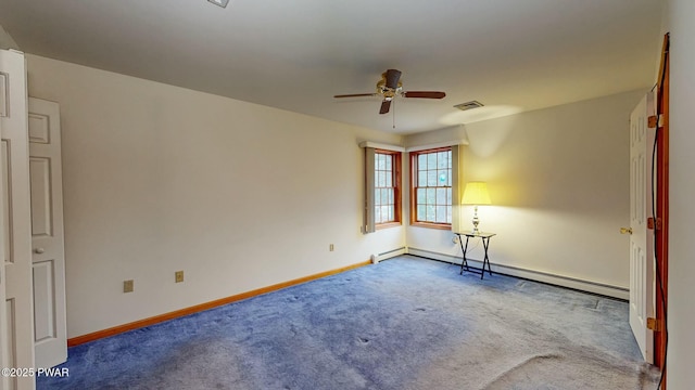 unfurnished room with baseboard heating, baseboards, carpet, and visible vents