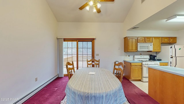 dining space featuring visible vents, baseboards, light carpet, a ceiling fan, and a baseboard radiator