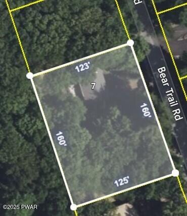 aerial map of property and surrounding area featuring property parcel outlined