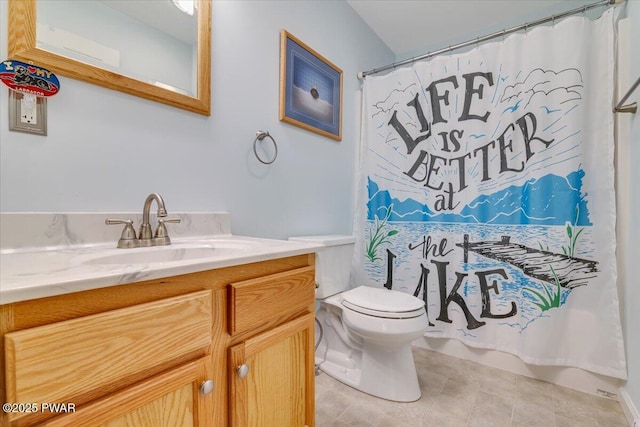 bathroom with toilet, vanity, and shower / tub combo with curtain