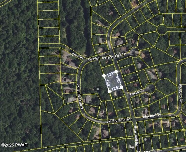 aerial map of property and surrounding area with property parcel outlined