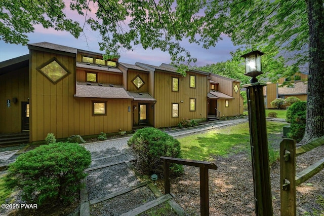 1107 Crest Cir, Lakeville, PA 18438 - view of front facade featuring a yard and roof with shingles