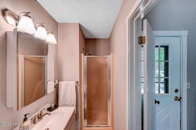 1107 Crest Cir, Lakeville, PA 18438 - bathroom with a stall shower, vanity, and a textured ceiling