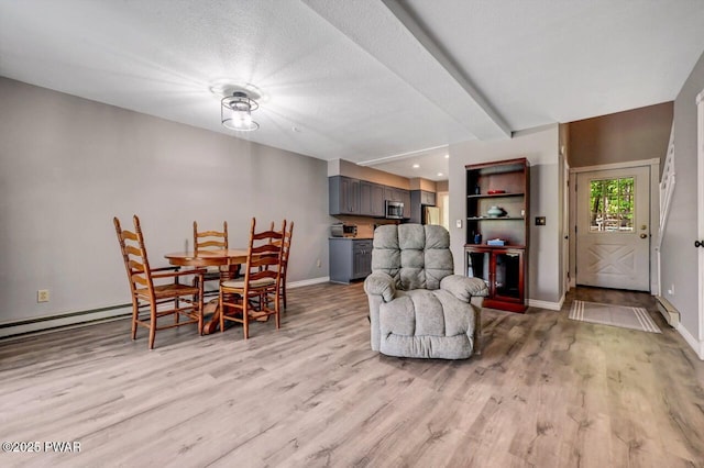 1107 Crest Cir, Lakeville, PA 18438 - dining area with light wood-type flooring, baseboards, and beamed ceiling