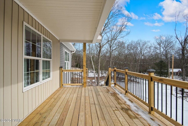 view of snow covered deck