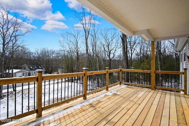 view of snow covered deck