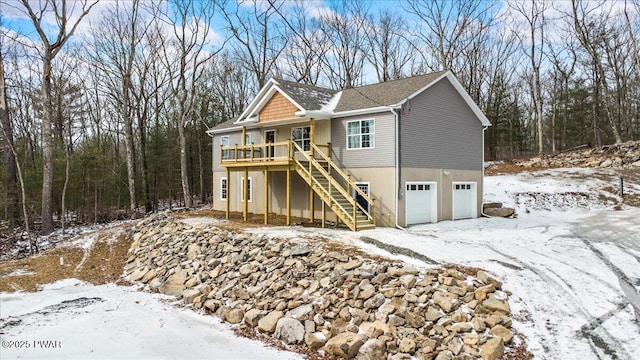 view of side of property featuring a garage