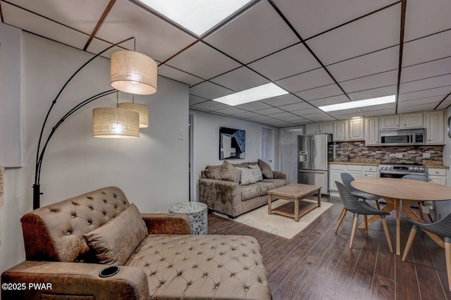 living area featuring dark wood-style flooring