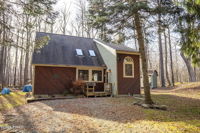 view of front of property with a storage unit