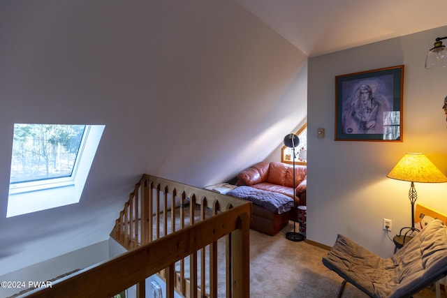 bedroom featuring lofted ceiling and carpet floors