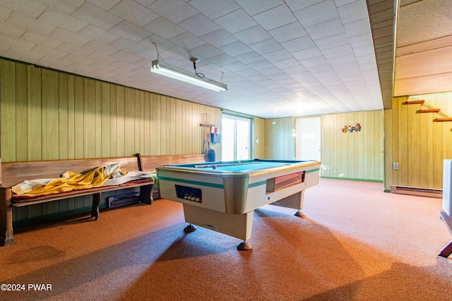 rec room with light colored carpet, wooden walls, and billiards