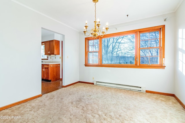 unfurnished dining area with carpet, an inviting chandelier, ornamental molding, and a baseboard heating unit