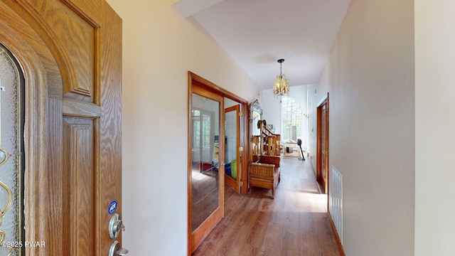109 Lake Dr, Dingmans Ferry, PA 18328 - hall with wood finished floors and french doors